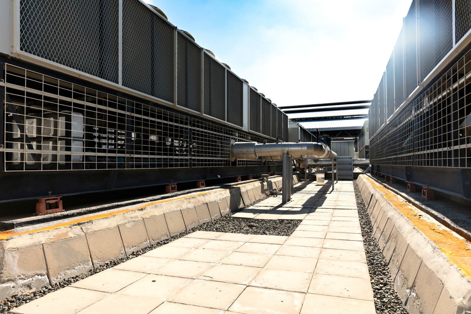 Rooftop chiller plant with air-cooled chiller units and chilled water piping
