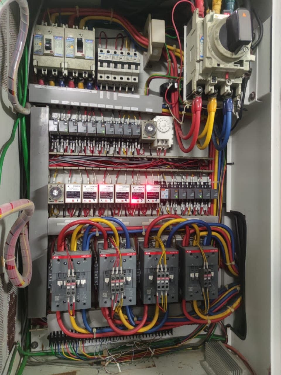 Building management system control panel with ABB contactors, breakers and field wiring